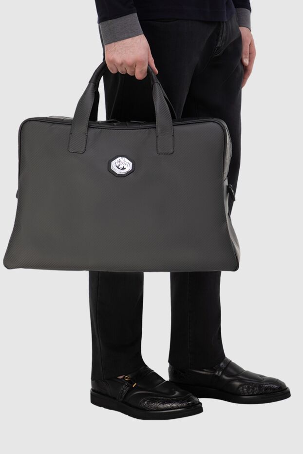 Black travel bag made of leather and carbon with shoulder strap men's - photo 2