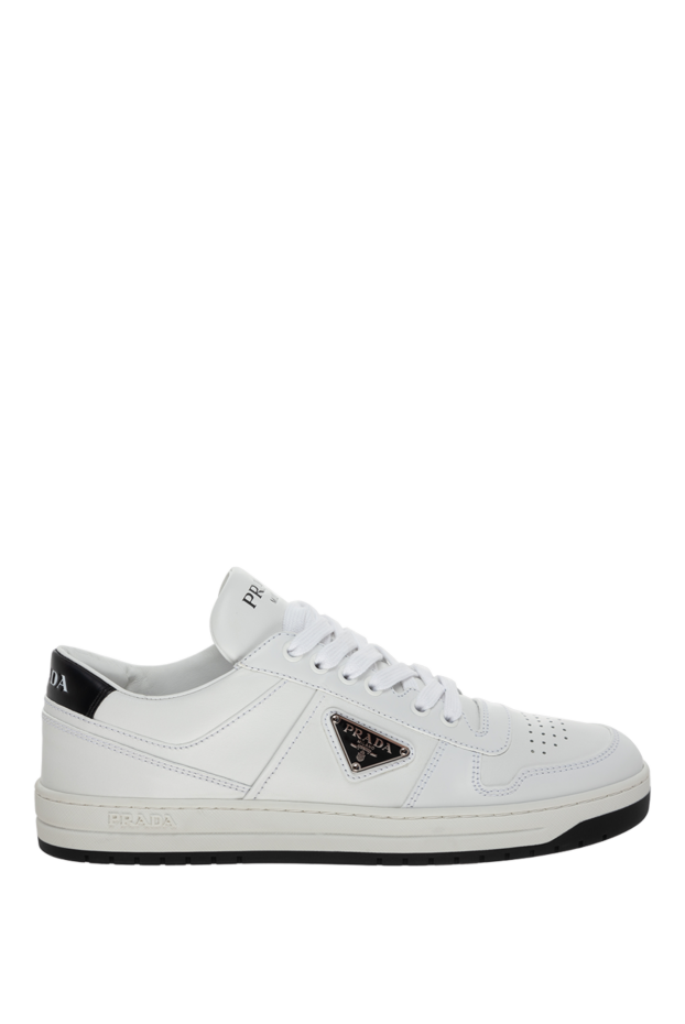 White leather sneakers with black sole and logo on the tongue
- photo 1