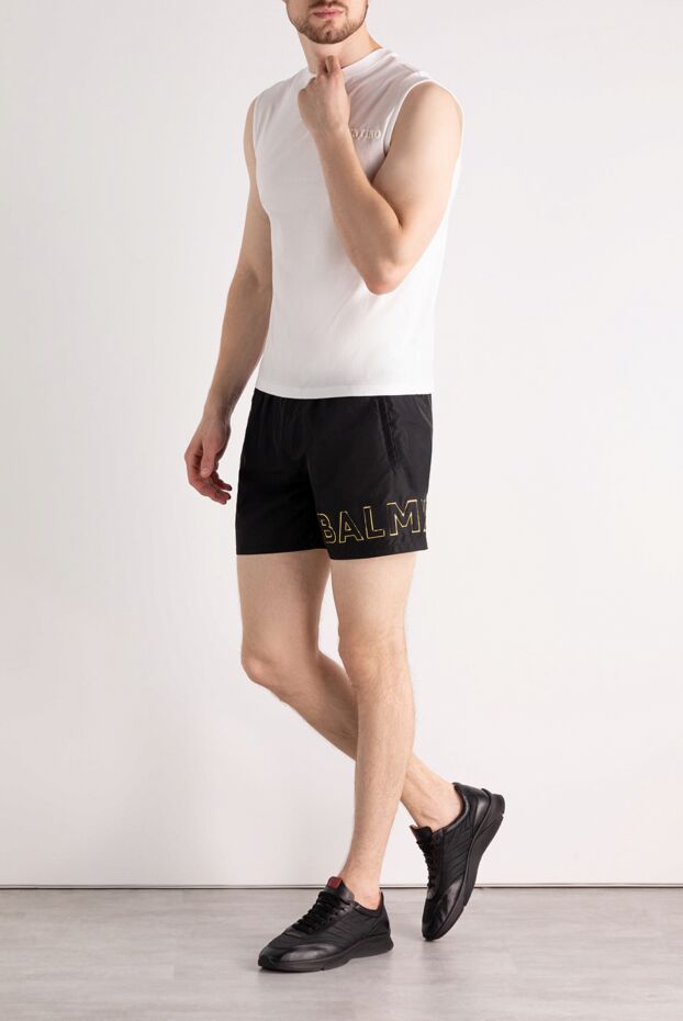 Men's black swim shorts with gold branding
 - photo 2