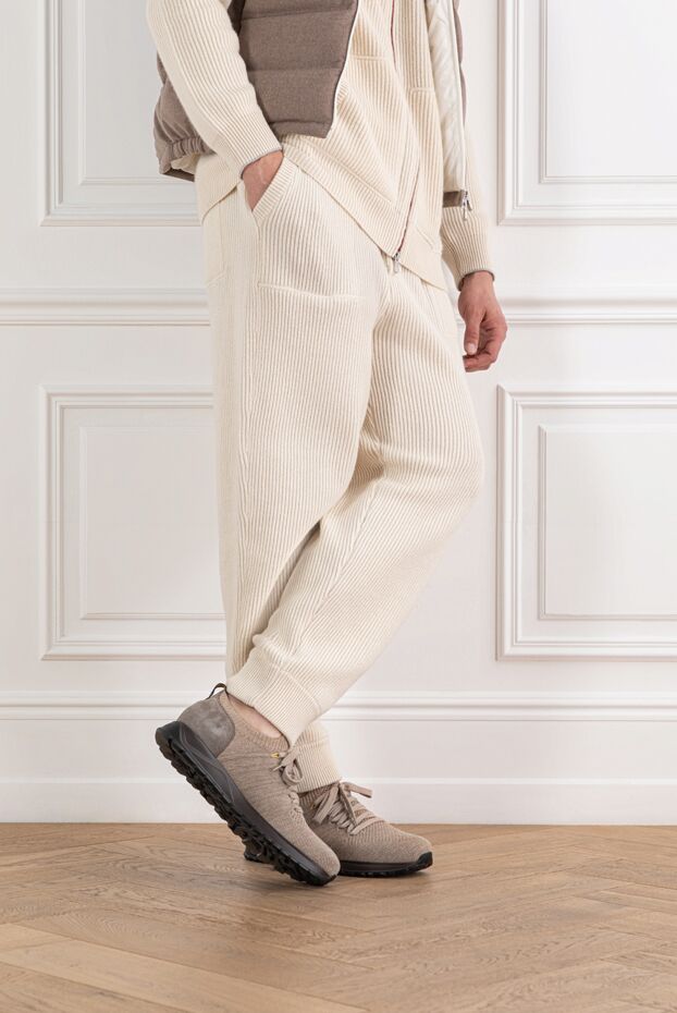 Doucal`s beige knit sneakers with a leather heel and black sole.
 190888 - photo 2