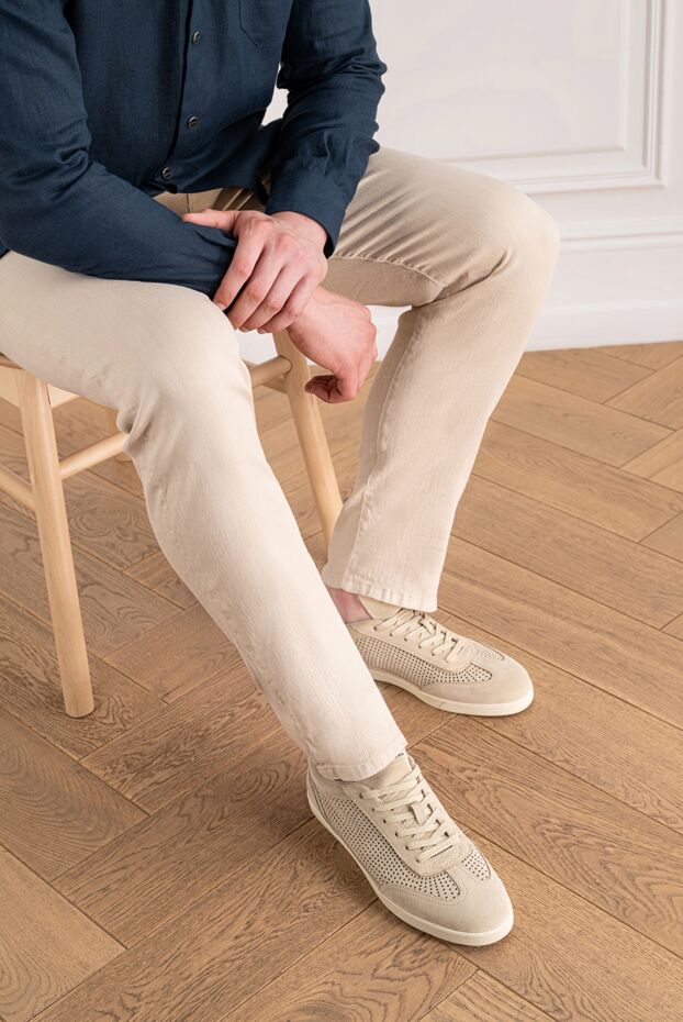 Beige suede sneakers with perforations and a logo on the tongue - photo 2