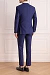 Костюм мужской из шерсти и шёлка синий Corneliani - Шлица. 85% шерсть, 15% шёлк. Пуговицы, крючок. Нагрудный карман, два кармана с клапанами. Карманы (внутренние): Три кармана. Два боковых кармана, два кармана сзади на пуговицах. 100% купро. Страна производитель: Италия. Уход: специализированная чистка - фото 4