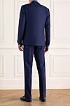 Костюм мужской из шерсти синий Corneliani - Шлица. 100% шерсть. Пуговицы, крючок. Нагрудный карман, два кармана с клапанами. Карманы (внутренние): Три кармана. Два боковых кармана, два кармана сзади на пуговицах. 100% купро. Страна производитель: Италия. Уход: специализированная чистка - фото 4