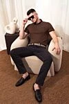 Мужские черные солнцезащитные очки из металла и пластика Gucci - лого на дужке. защита от ультрафиолета. пластик, металл. Страна производитель: Италия. Уход: специализированная чистка - фото 6