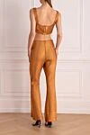 Костюм брючный коричневый женский Herve Leger - 66% район, 33% нейлон, 1% спандекс. молния. два боковых кармана. Страна производитель: Франция. Уход: специализированная чистка - фото 4