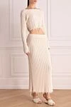 Balmain Мақта мен полиамидтен тігілген юбкасымен ақ түсті әйелдер костюмі - жыртылған жиек. Құрамы: 78% мақта, 22% полиамид. Жабу: найзағай. Шығарылған елі: Франция. Күтім: арнайы тазалау - фото 3