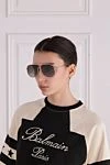 Солнечные очки женские с золотой оправой Dior - Логотип. защита от ультрафиолетового излучения. Метал. Коричневой. Страна производитель: Франция. Уход: специализированная чистка - фото 2