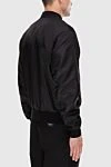 Black polyamide bomber for men Dolce & Gabbana - rubber plate with Dolce & Gabbana logo. Regular fit, Collar, hem and cuffs in stretch jersey. Compound:. External composition: 100% Polyamide. Internal 100% Polyamide. Closure: Front closure with logo buttons. Exterior and interior welt pockets with zippers. Lining: Mesh lining. Insulation: Lightweight inner padding. Country of manufacture: Italy. Care: specialized cleaning - photo 4