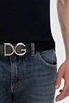 Black leather belt for men Dolce & Gabbana - DG logo buckle:. Plate buckle and mushroom closure Single loop belt clip. External composition: 100% Calfskin. Internal 100% Calfskin. Size: Belt width 25 mm. Country of origin: Italy. Care: specialized cleaning - photo 2