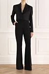 Женские шерстяные классические брюки клёш чёрные Balmain - расклешенный крой. два боковых кармана. шерсть. пуговица, молния. Страна производитель: Франция. Уход: специализированная чистка - фото 2