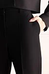 Balmain Женские шерстяные классические брюки клёш чёрные - расклешенный крой. два боковых кармана. шерсть. пуговица, молния. Страна производитель: Франция. Уход: специализированная чистка - фото 5