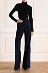 Брюки из шерсти синие женские Balmain - расклешенный крой. два боковых кармана. шерсть. пуговица, молния. Страна производитель: Франция. Уход: специализированная чистка - фото 2