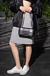 Сумка из кожи черная женская Burberry - декоративные швы, металлический логотип. магнитная кнопка. 100% натуральная кожа.. Размер: 24*14*7 см. Страна производитель: Италия. Уход: специализированная чистка - фото 8