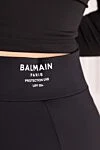 Леггинсы из полиамида и эластана женские черные Balmain - логотип бренда. 80% полиамид, 20% эластан. Страна производитель: Франция. Уход: специализированная чистка - фото 6