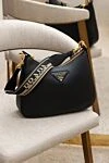 Женская черная сумка из натуральной кожи с логотипом Prada - логотип бренда. 100% натуральная кожа. молния. Страна производитель: Италия . Уход: специализированная чистка - фото 6