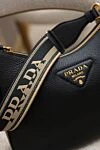 Prada Женская черная сумка из натуральной кожи с логотипом - логотип бренда. 100% натуральная кожа. молния. Страна производитель: Италия . Уход: специализированная чистка - фото 7