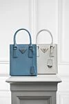 Сумка из натуральной кожи голубая женская голубая Prada - логотип бренда, подвеска с брелоком. 100% натуральная кожа. молния. . Страна производитель: Италия . Уход: специализированная чистка - фото 6