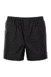 Valentino Men's black beach shorts with logo - logo pattern. 100% polyamide. Fastener: elastic band, zipper. two side pockets, one back pocket. Country of manufacture: Italy. Care: specialized cleaning - photo 1