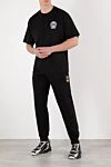 Брюки мужские спортивные черные Dolce & Gabbana - логотип DG. 71% хлопок, 29% полиэстер. два боковых кармана, один задний на молнии. . . Страна производитель: Италия. Уход: специализированная чистка - фото 2