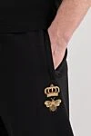 Dolce & Gabbana Брюки мужские спортивные черные - логотип DG. 71% хлопок, 29% полиэстер. два боковых кармана, один задний на молнии. . . Страна производитель: Италия. Уход: специализированная чистка - фото 5