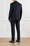 Мужской костюм однобортный синий из шерсти Corneliani - 100% шерсть. пуговицы. 2 боковых кармана, один нагрудный. Страна производитель: Италия. Уход: специализированная чистка - фото 4