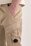 C.P. Company Men's beige tapered cargo pants - Decoration: C.P. Company lens. 98% cotton, 2% polyamide. zipper, button. two side pockets, two back pockets, two leg pockets. Country of origin: Italy. Care: Specialized cleaning - photo 5