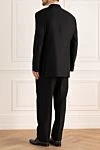 Black wool and silk men's suit Canali - Slit. 60% wool, 40% silk. Closure: Buttons, hook. Chest pocket, two flap pockets. Three pockets. Two side pockets, two back pockets with buttons. Lining: 100% cupro. Country of origin: Italy. Care: specialized cleaning - photo 4