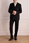 Костюм мужской из шерсти черный Canali - Шлица. 100% шерсть. Пуговицы, крючок. Нагрудный карман, два кармана с клапанами. Карманы (внутренние): Три кармана. Два боковых кармана, два кармана сзади на пуговицах. 100% купро. Страна производитель: Италия. Уход: специализированная чистка - фото 2