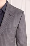 Brioni Костюм мужской из шерсти и шелка серый - Узор полоска, шлица. 85% шерсть, 15% шёлк. Пуговицы, крючок. Нагрудный карман, два кармана с клапанами. Карманы (внутренние): Три кармана. Два боковых кармана, два кармана сзади на пуговицах. 100% купро. Страна производитель: Италия. Уход: специализированная чистка - фото 5