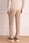 Брюки бежевые мужские Brioni - защипы. 85% шерсть, 10% кашемир, 5% шелк. пуговица, молния. карман под поясом, два боковых кармана, два кармана сзади с клапанами на пуговицах. Страна производитель: Италия. Уход: специализированная чистка - фото 4