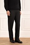 Brioni Брюки черные мужские - защипы. 85% шерсть, 10% кашемир, 5% шелк. пуговица, молния. карман под поясом, два боковых кармана, два кармана сзади с клапанами на пуговицах. Страна производитель: Италия. Уход: специализированная чистка - фото 3