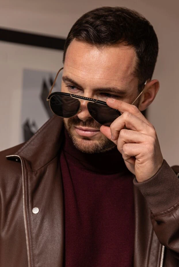 Glasses in a metal frame with a decorative top cover
- photo 2