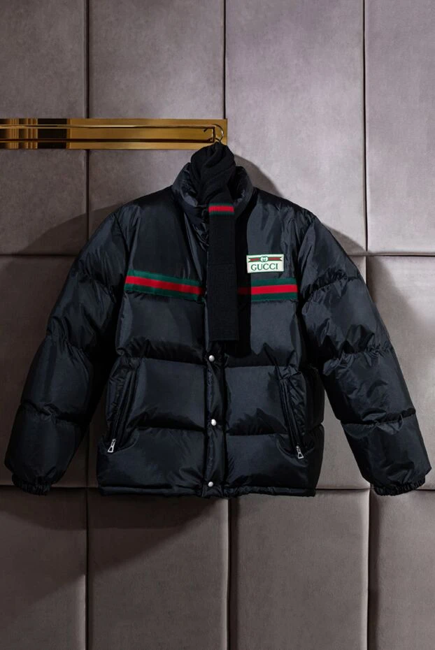Black down jacket with contrasting green and red inserts
- photo 2