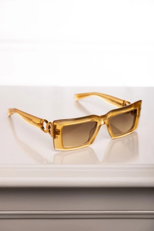 Women's yellow plastic sunglasses for sun protection - photo 2