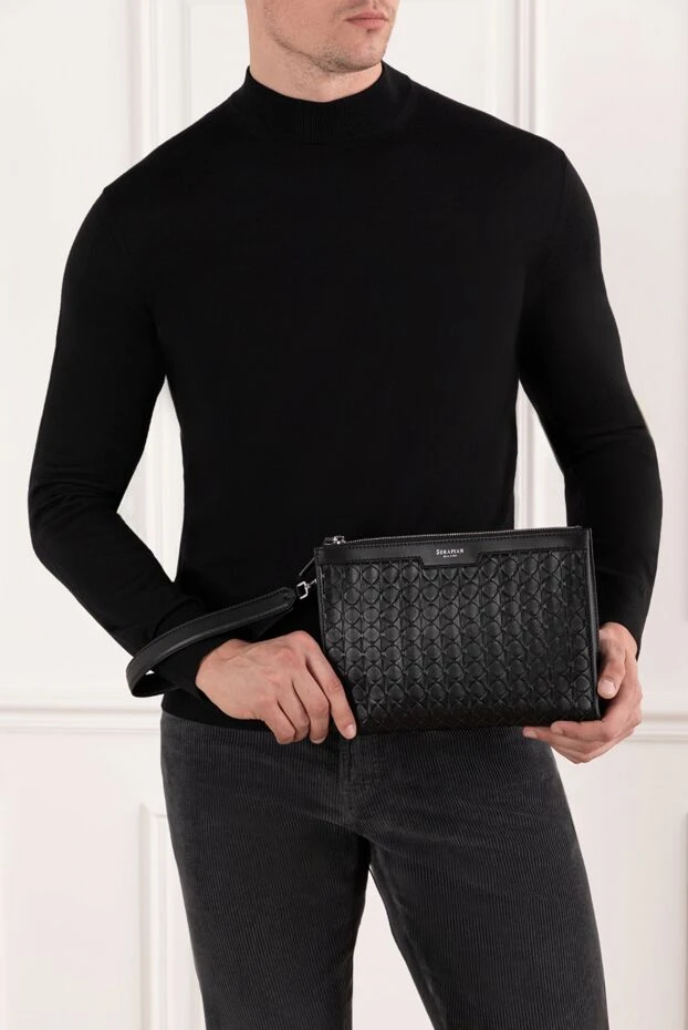 Black leather clutch with relief texture - photo 2