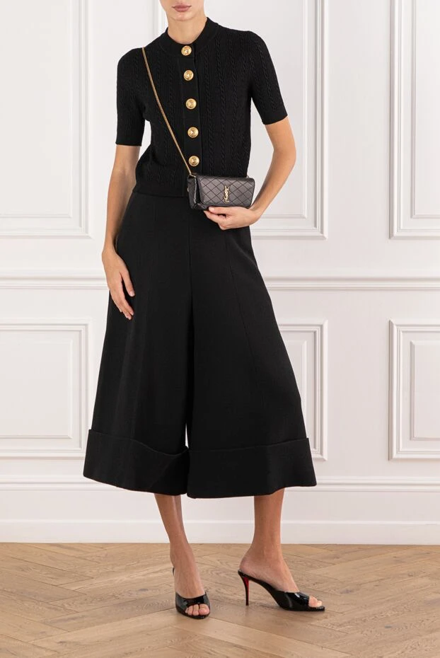 Black knitted cardigan with short sleeves and gold buttons - photo 2