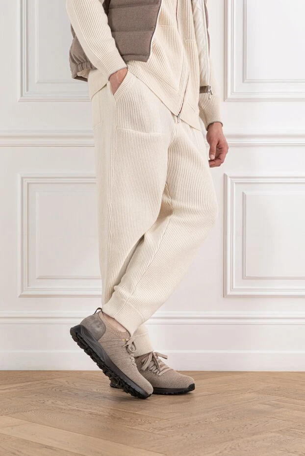 Doucal`s beige knit sneakers with a leather heel and black sole.
190888 - photo 2